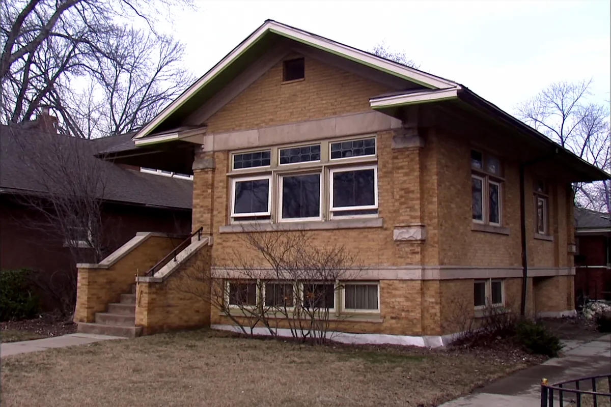 Brick bungalow with an art-glass transom in Chicago, Illinois